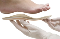 How Custom Orthotics May Help Those With Arthritis in the Feet